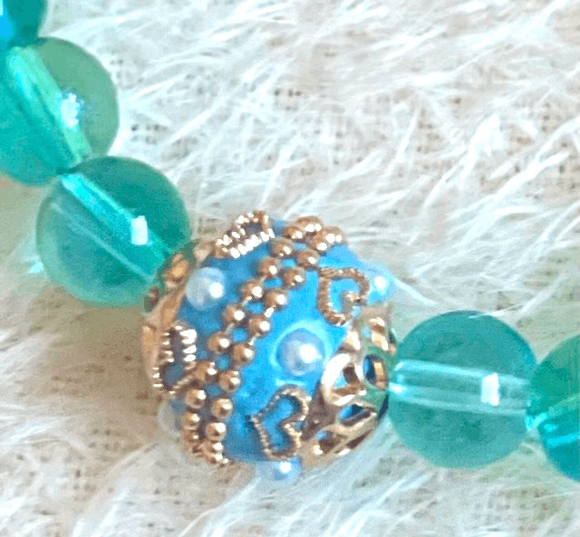 D07 - Dragonne téléphone perles verre ton bleu vert
