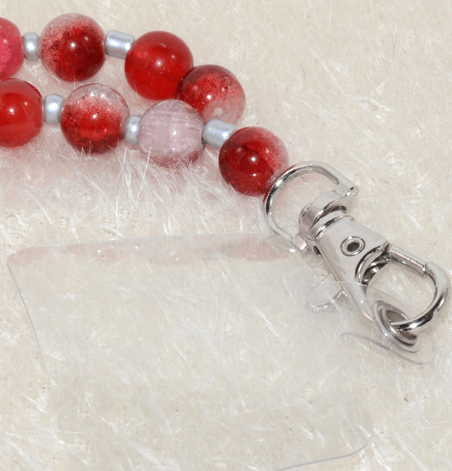 D03 - Dragonne téléphone perles verre cerise et métal