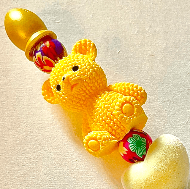 S51 - Stylo à perles et ours jaune
