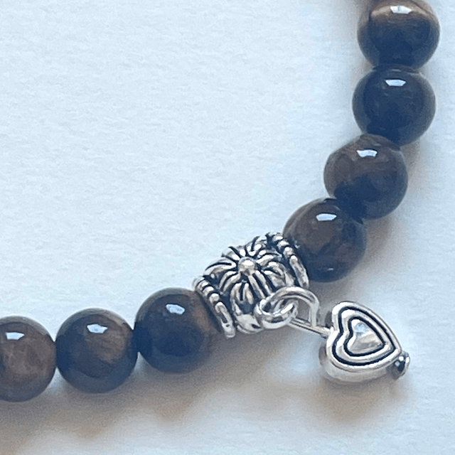 B47- Bracelet oeil de tigre et charms en métal