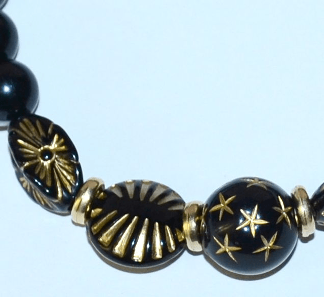 B82 - Bracelet perle acrylique ton noir et doré