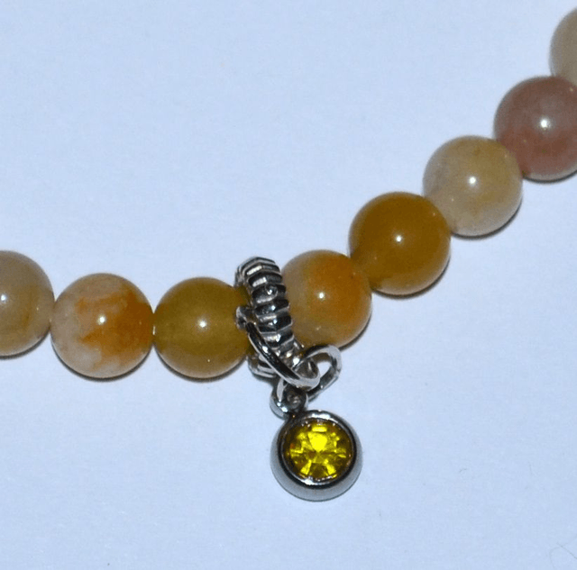 B71- Bracelet agate ambrée , charm strass