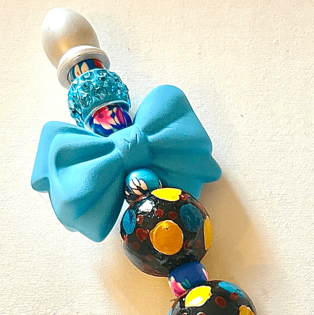 S36 - Stylo à perles noeud bleu