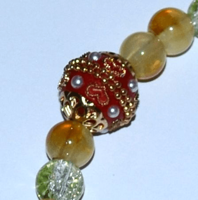 D19 - Dragonne téléphone perles verre ton jaune